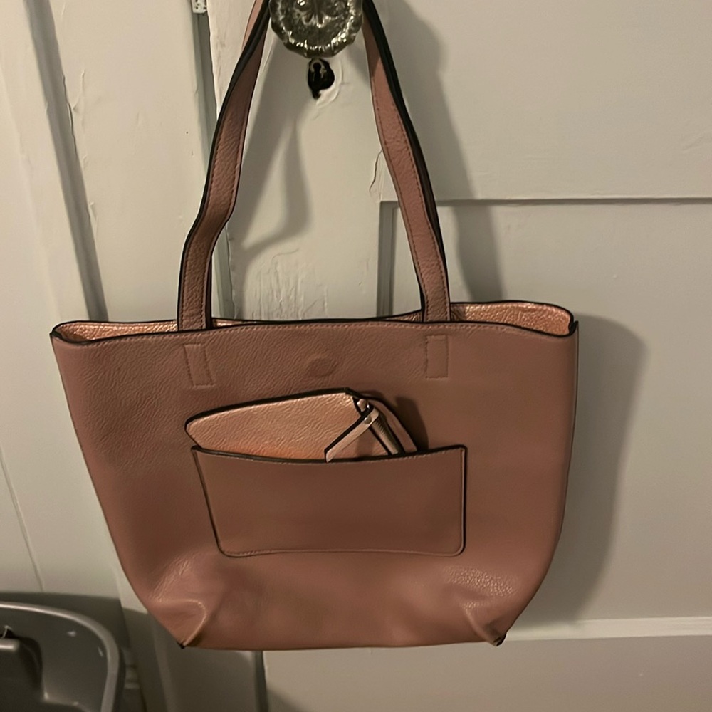 Pink purse with pink smaller hand bag